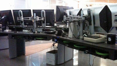 Extio units are installed discretely underneath the monitors