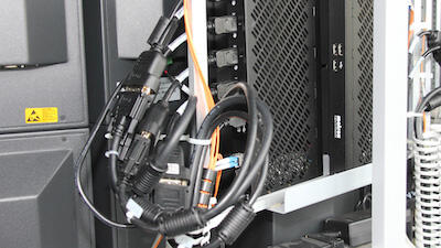 Extio KVM extenders mounted behind desktop display