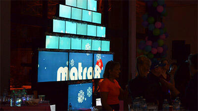 QuadHead2Go-Powered Holiday Party Video Wall